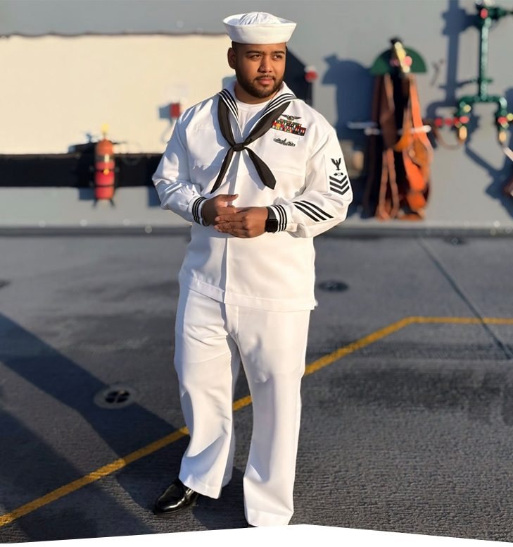Aulundrew in U.S. Navy dress whites on the deck of a ship